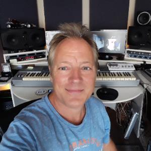 Andre Touhey,Senior Editor